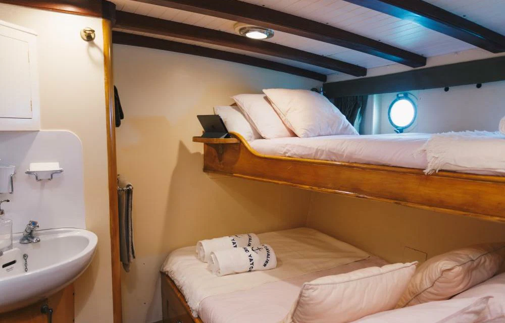 a couple of beds in a hotel room aboard SILVER CAVALIER Yacht for Sale