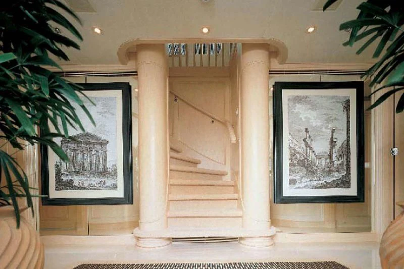 a white column with a painting on it aboard OLYMPIA Yacht for Sale