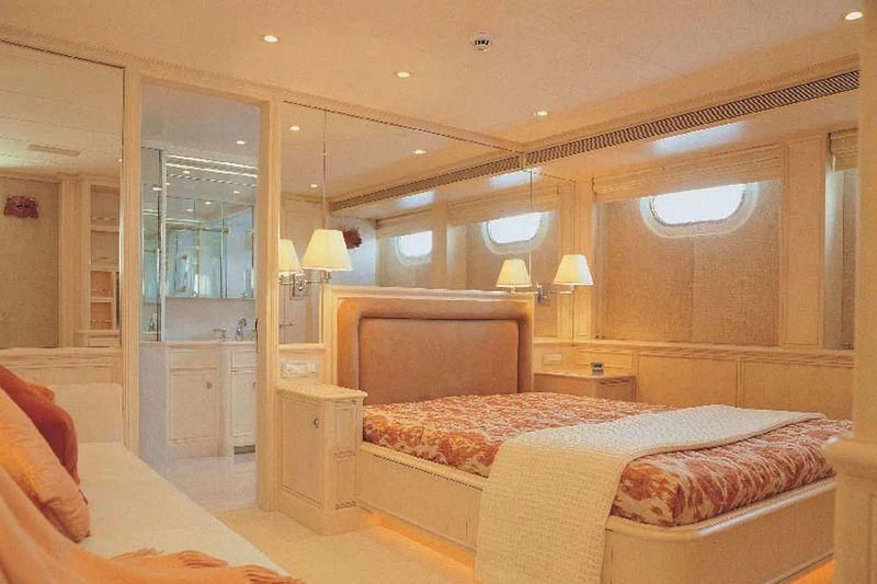 a room with two beds aboard OLYMPIA Yacht for Sale