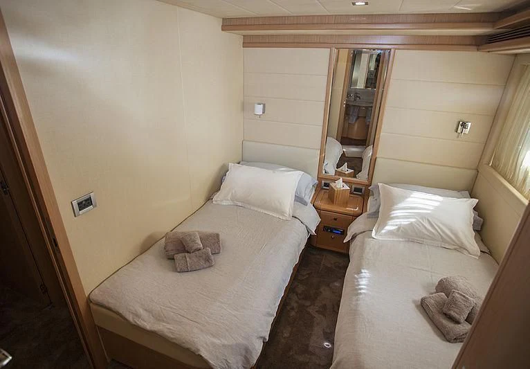 a couple of beds in a room aboard YOYITA Yacht for Sale