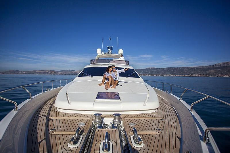 a couple on a boat aboard YOYITA Yacht for Sale