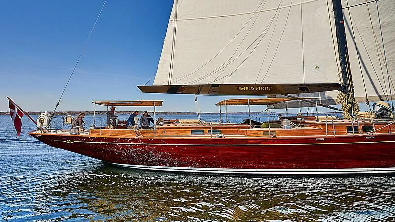 a boat on the water aboard TEMPUS FUGIT Yacht for Sale