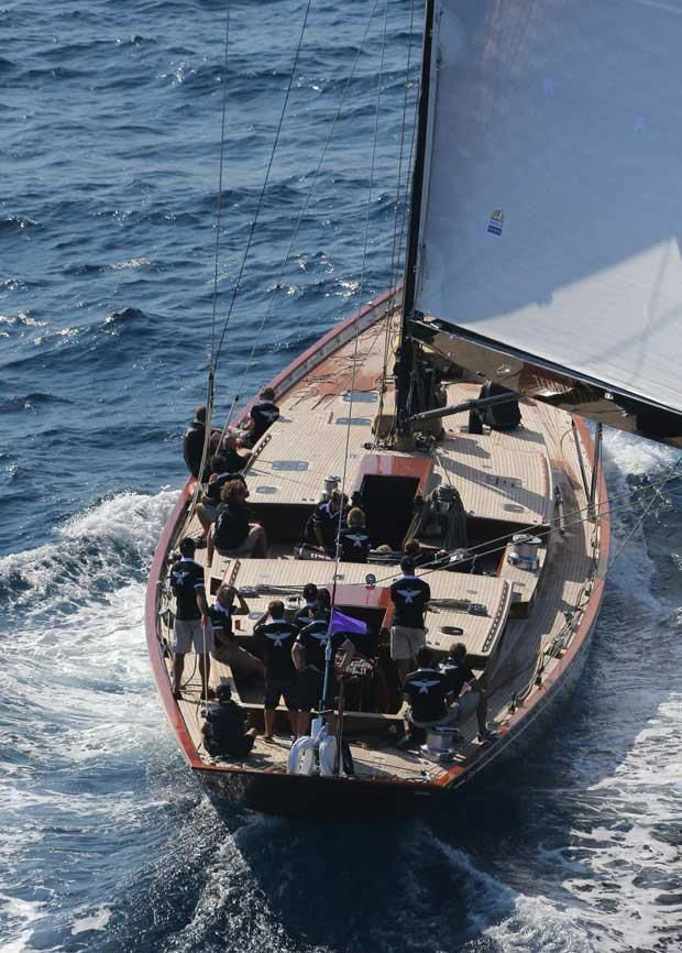 a group of people on a boat aboard TEMPUS FUGIT Yacht for Sale