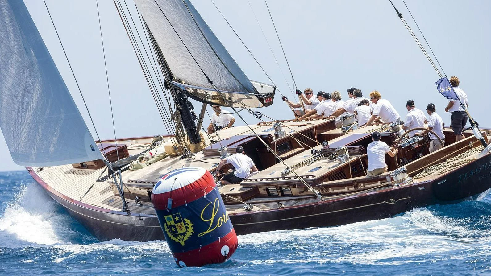 a group of people on a sailboat aboard TEMPUS FUGIT Yacht for Sale
