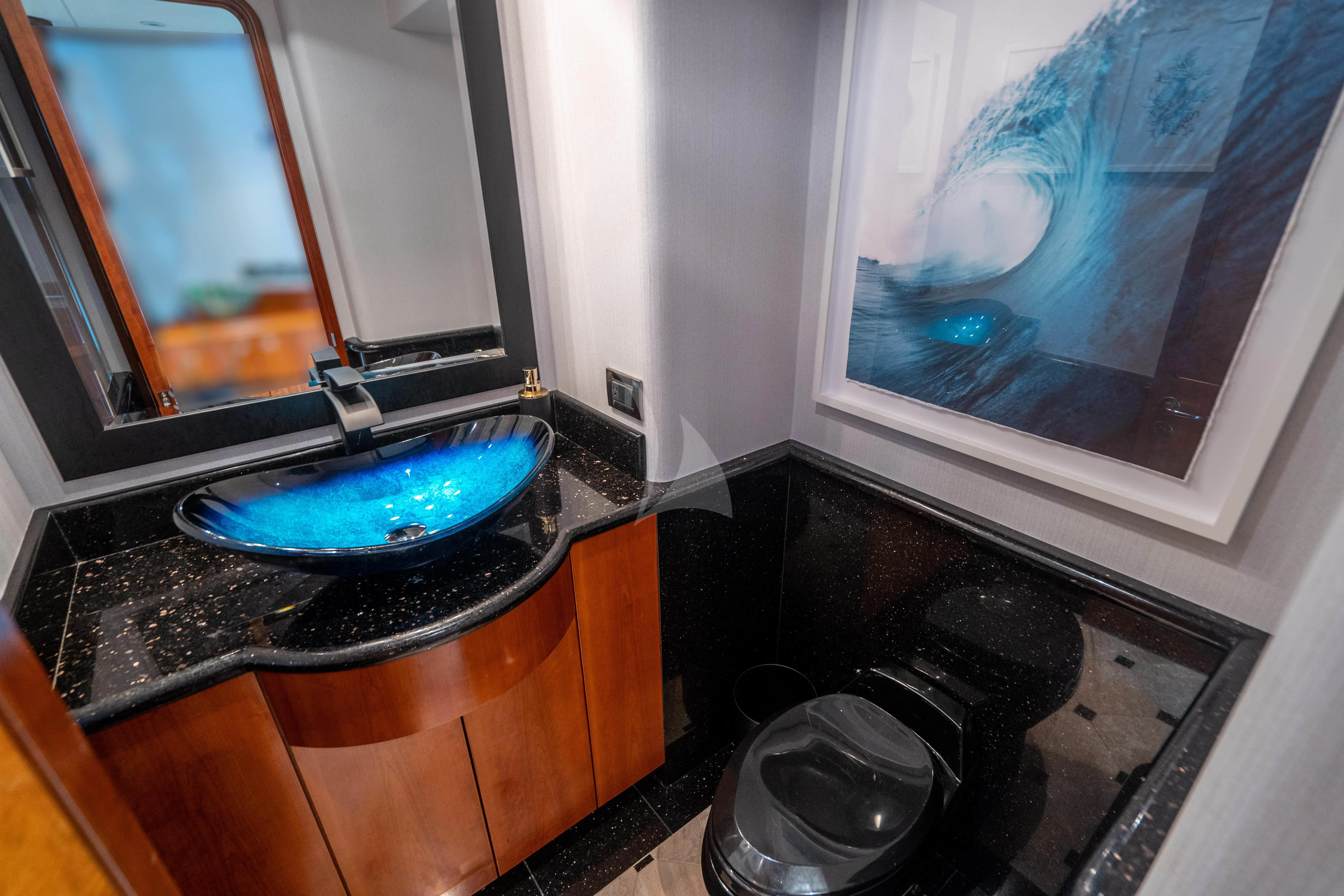 a sink with a large mirror aboard LILA CUY Yacht for Sale