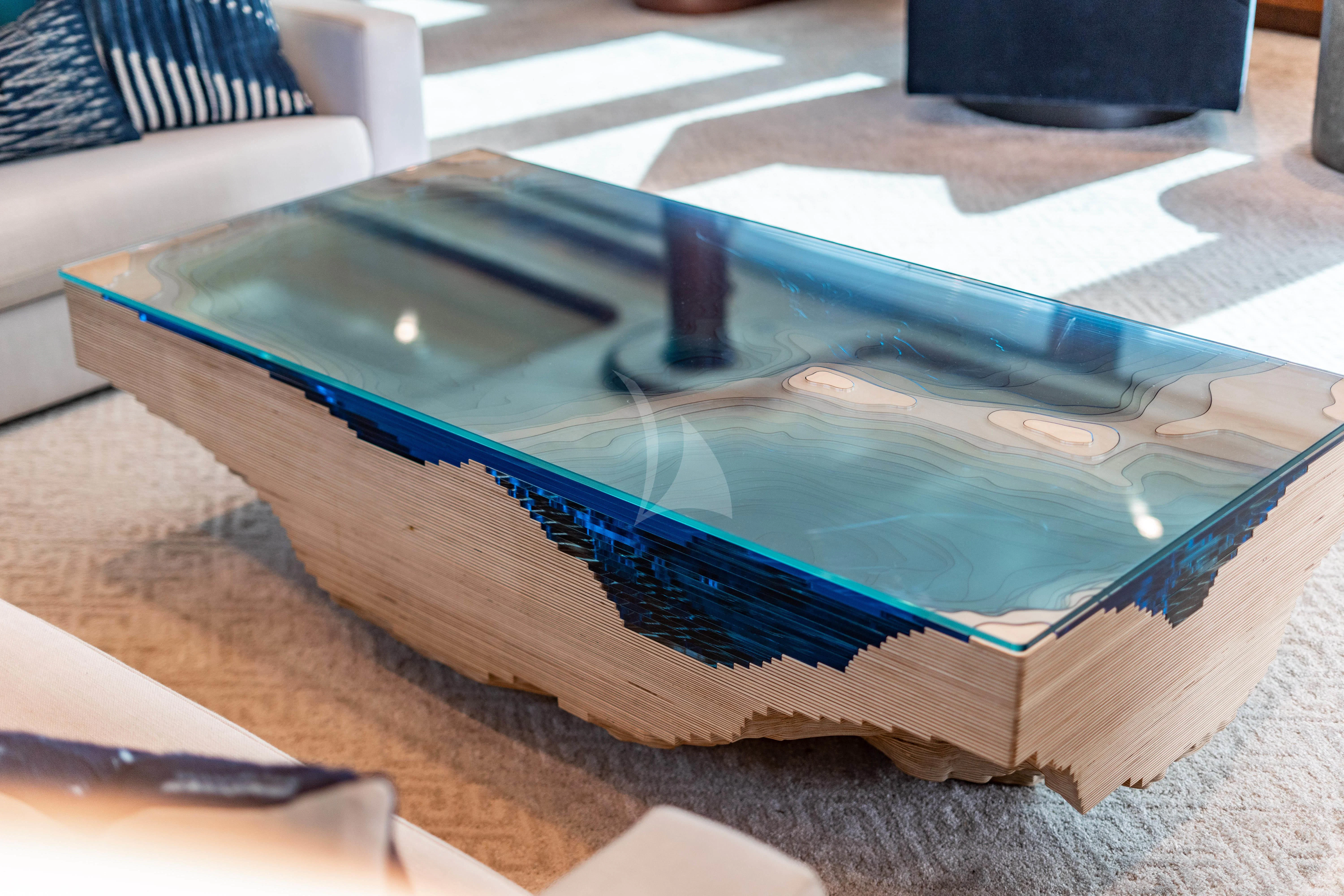 a blue box with a black object on top of it aboard LILA CUY Yacht for Sale