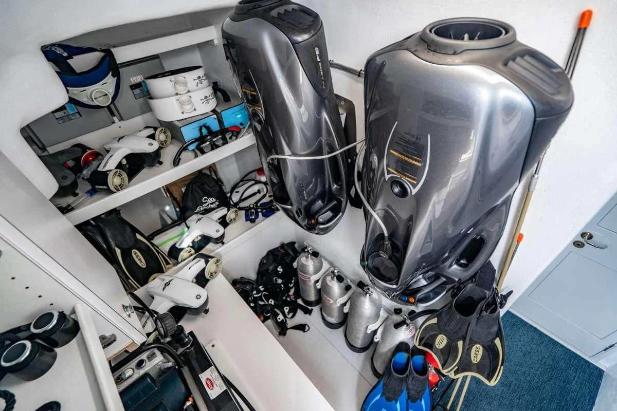 a car engine with a blue background aboard LILA CUY Yacht for Sale