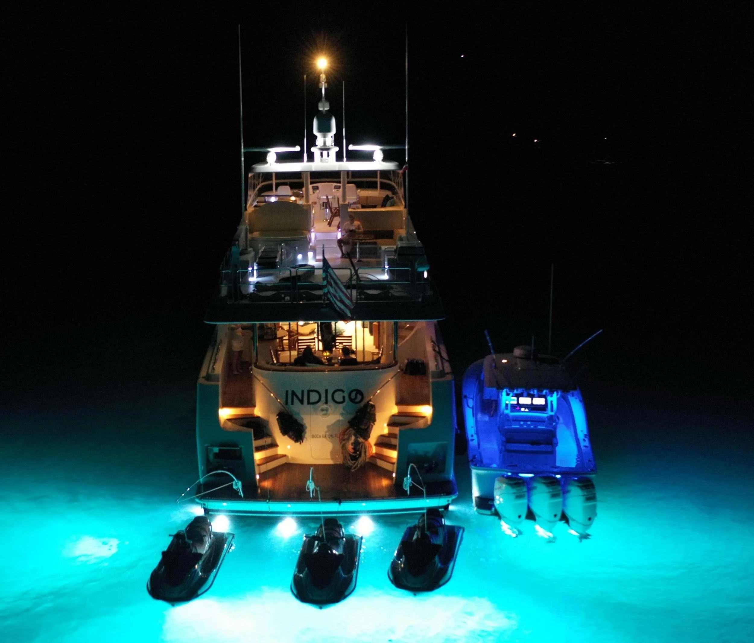 a robot with a light bulb on top aboard LILA CUY Yacht for Sale