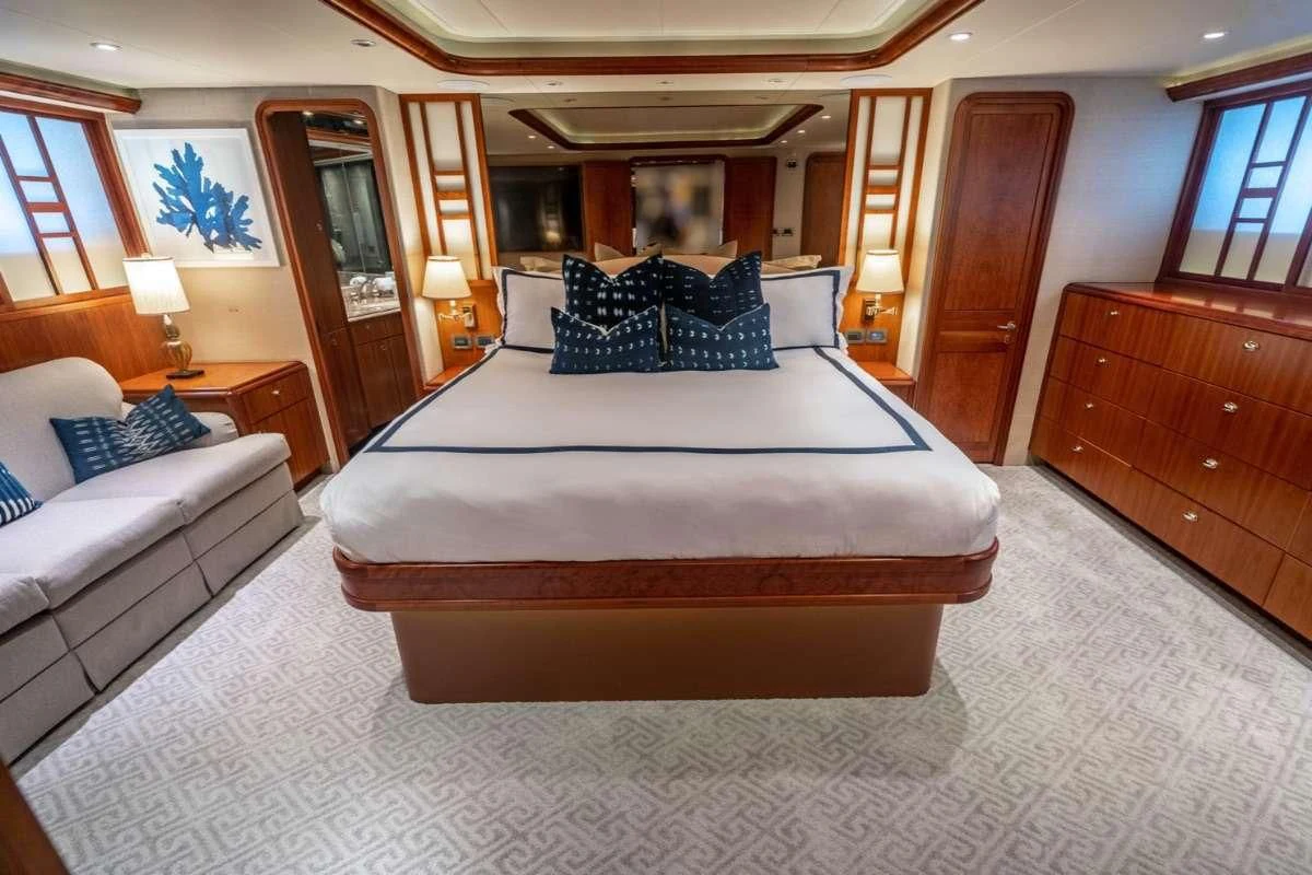 a large bed in a room aboard LILA CUY Yacht for Sale