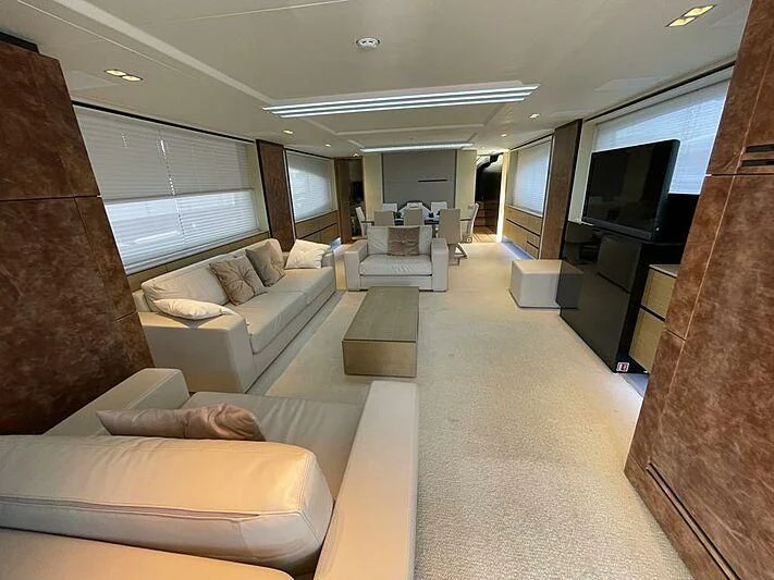 a living room with a large screen aboard OZONE Yacht for Sale
