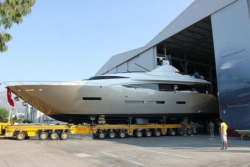 a large airplane on a trailer aboard OZONE Yacht for Sale