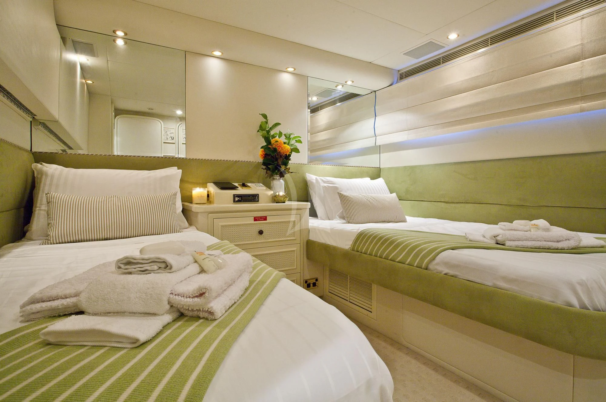a room with beds and a bed aboard OSCAR II Yacht for Sale