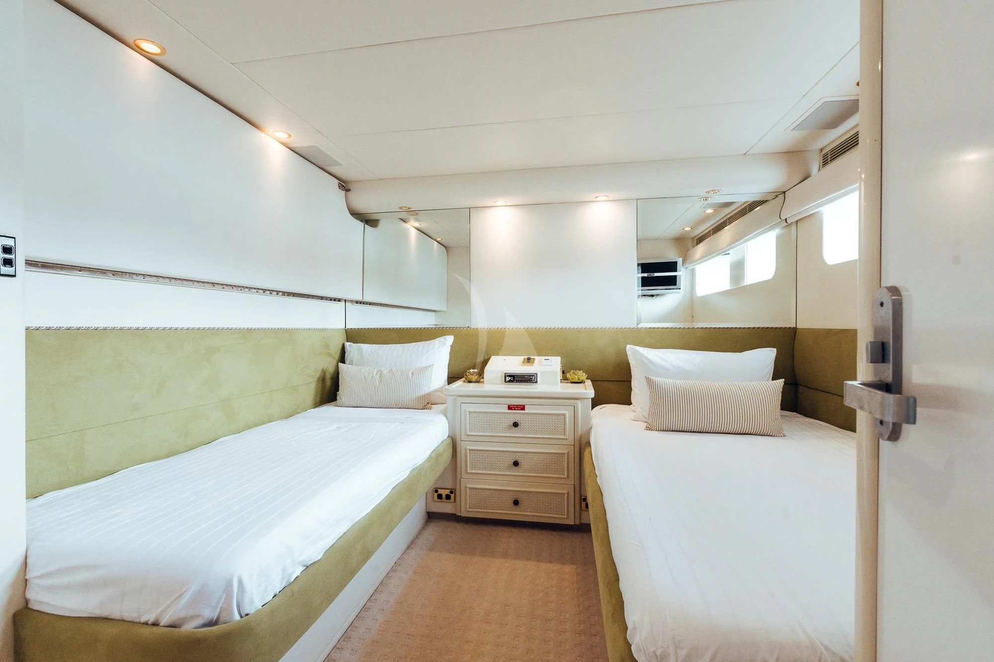 a room with two beds aboard OSCAR II Yacht for Sale