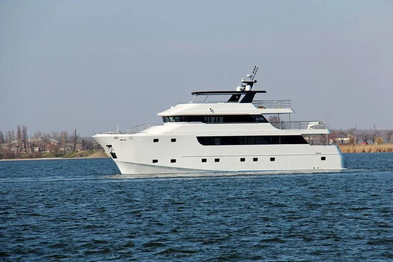 a white yacht in the water aboard IVAR Yacht for Sale