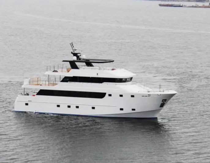 a white yacht in the water aboard IVAR Yacht for Sale