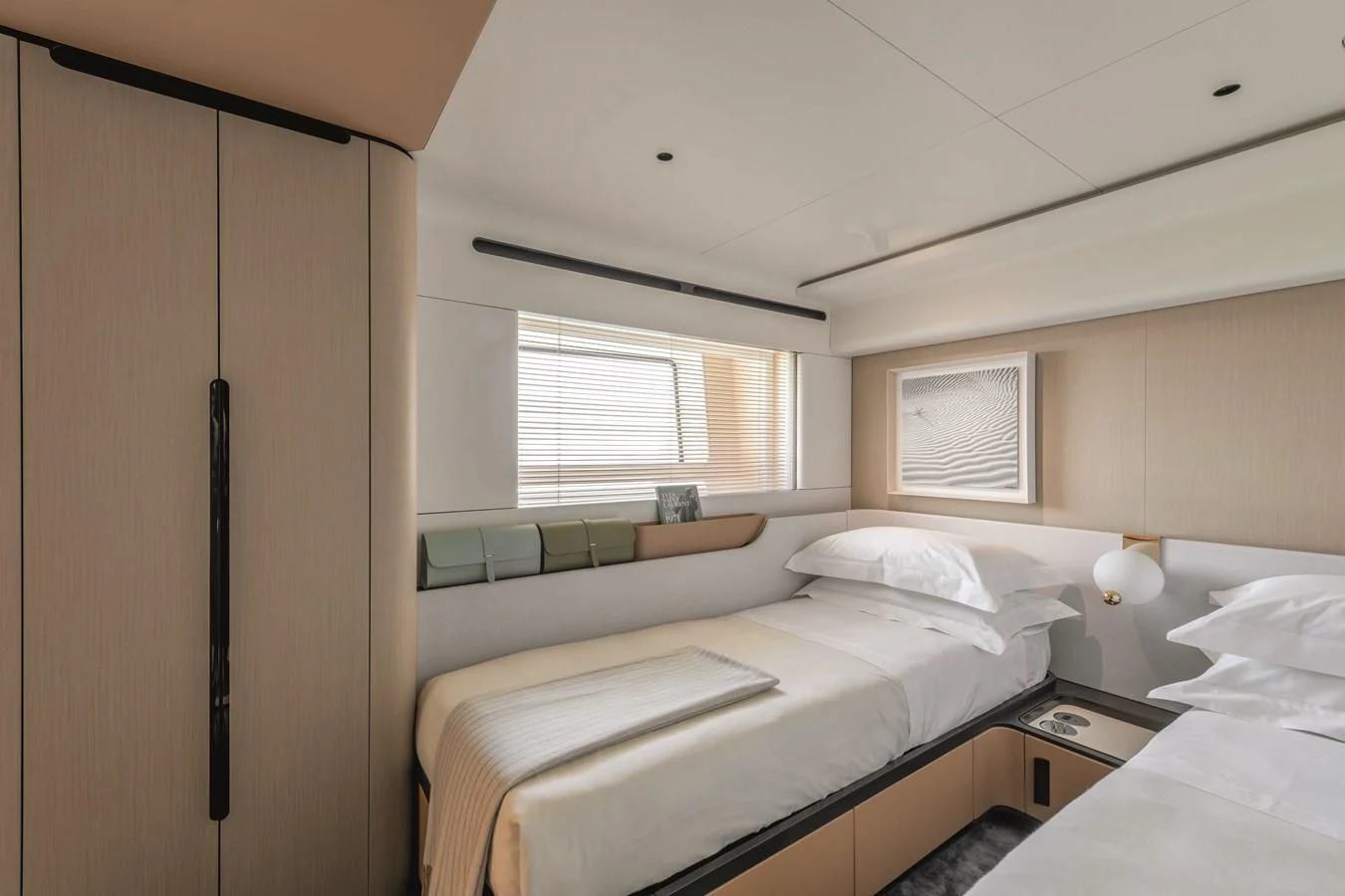 a room with two beds aboard R.DARENBEN Yacht for Sale