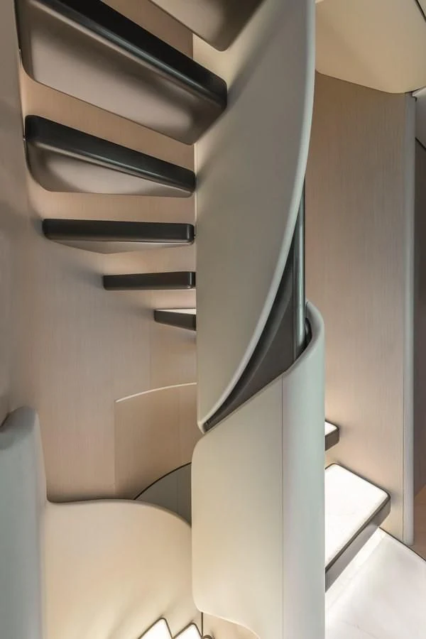 a white and black staircase aboard R.DARENBEN Yacht for Sale