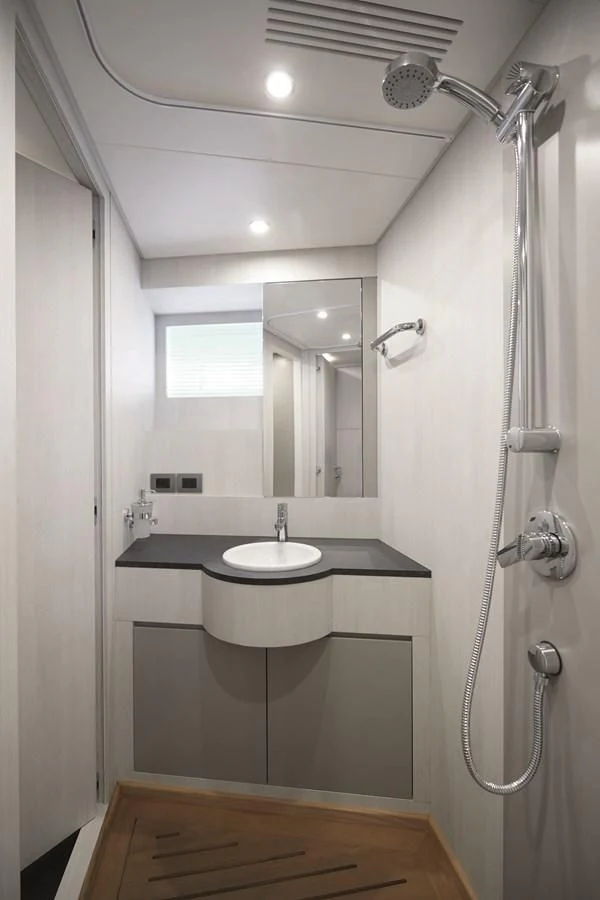 a bathroom with a sink and a shower aboard R.DARENBEN Yacht for Sale