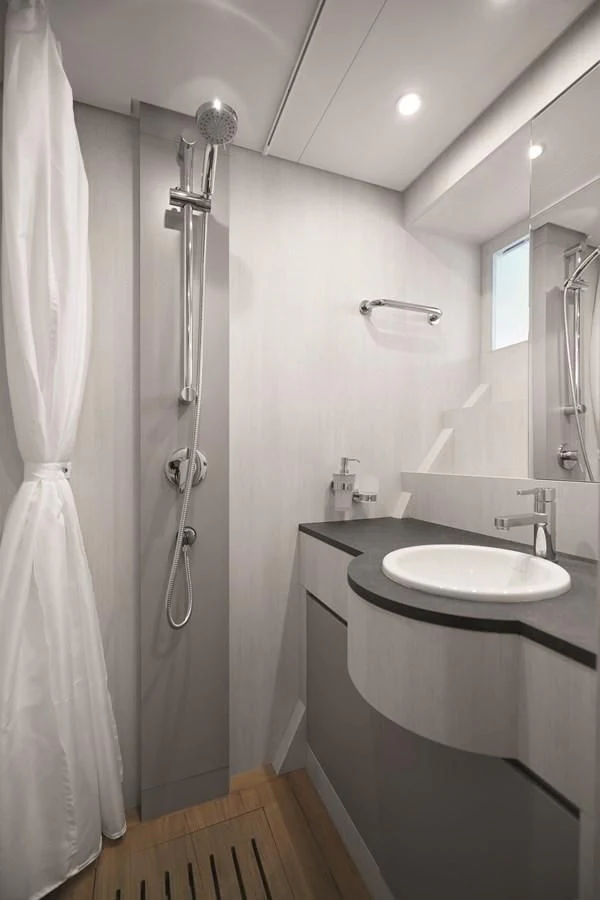 a bathroom with a sink and a shower aboard R.DARENBEN Yacht for Sale