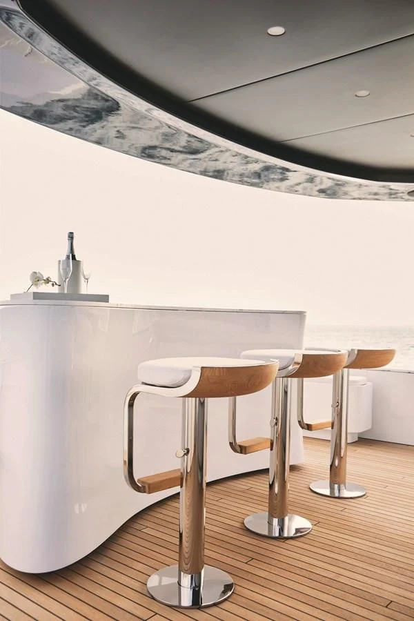 a stool and a table aboard R.DARENBEN Yacht for Sale