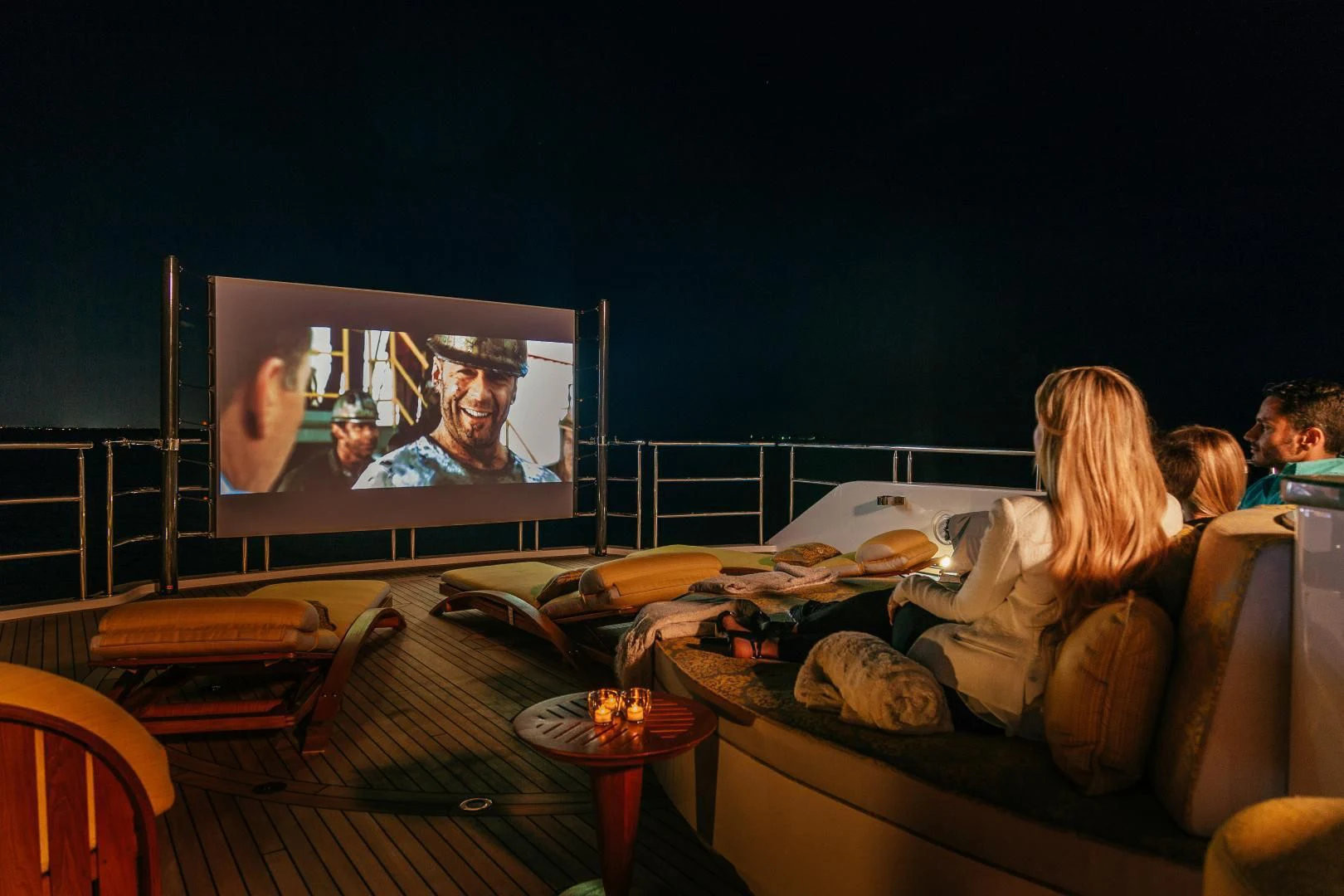 a television screen showing a movie aboard STARSHIP Yacht for Charter