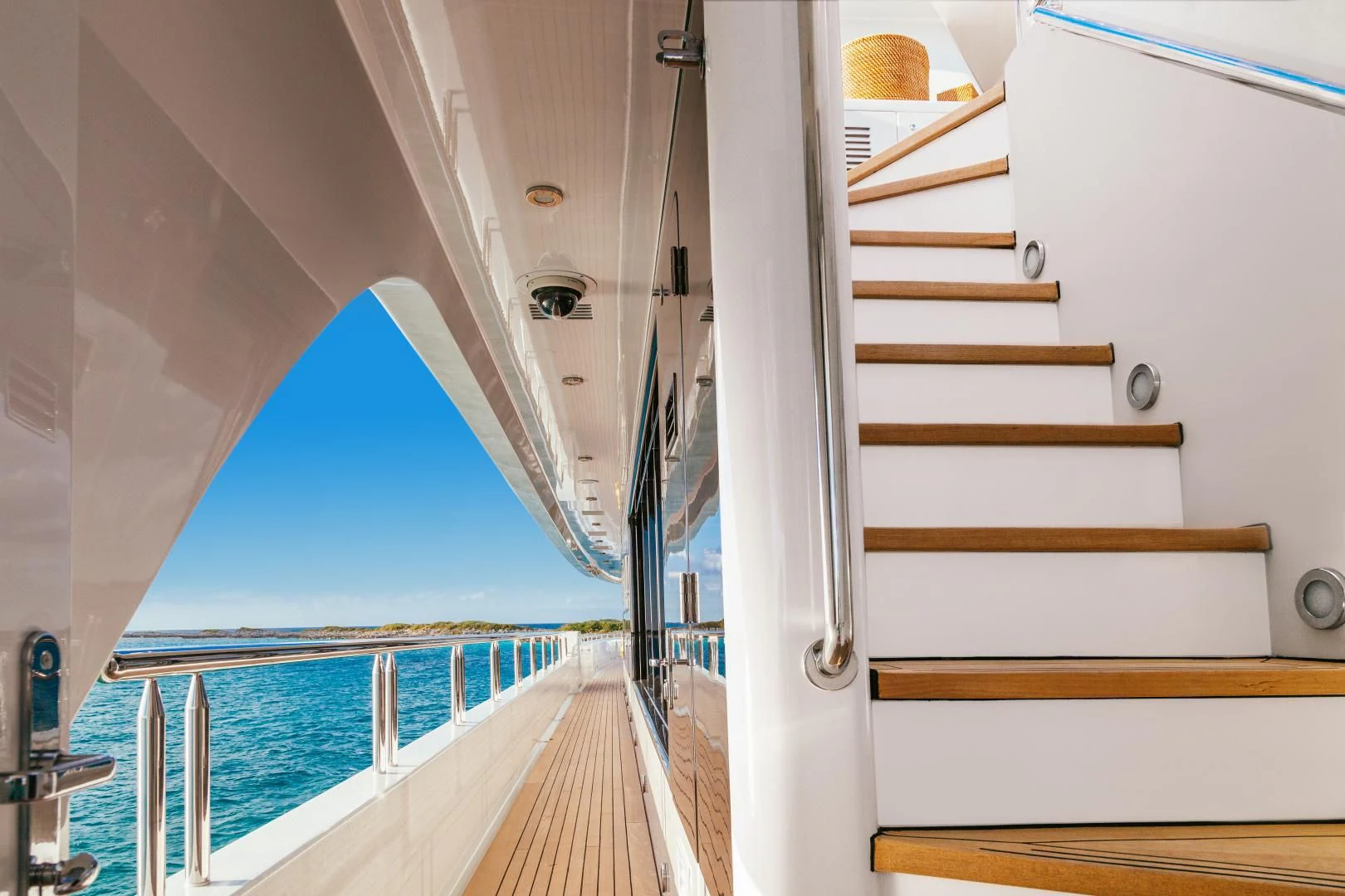 a white boat on a body of water aboard STARSHIP Yacht for Charter