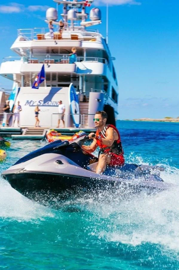 a man on a jet ski aboard STARSHIP Yacht for Charter