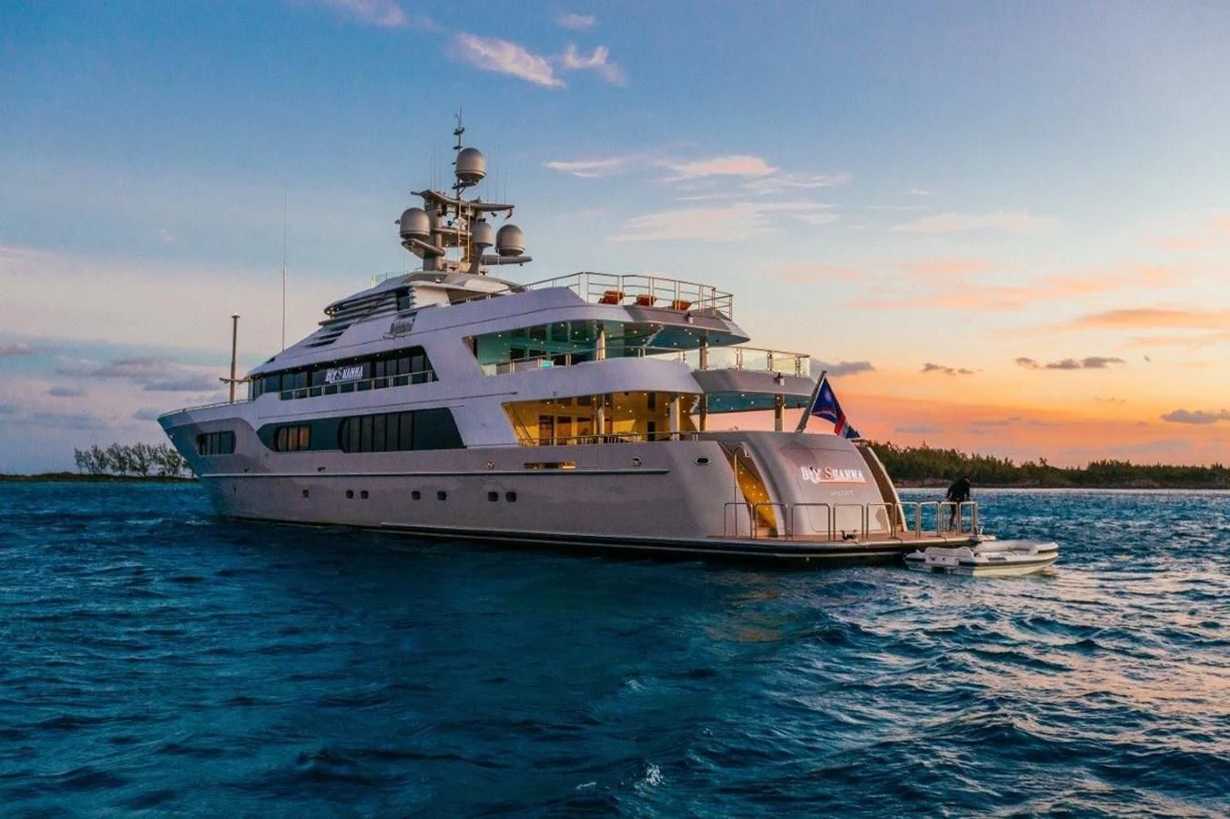 a large boat in the water aboard STARSHIP Yacht for Charter