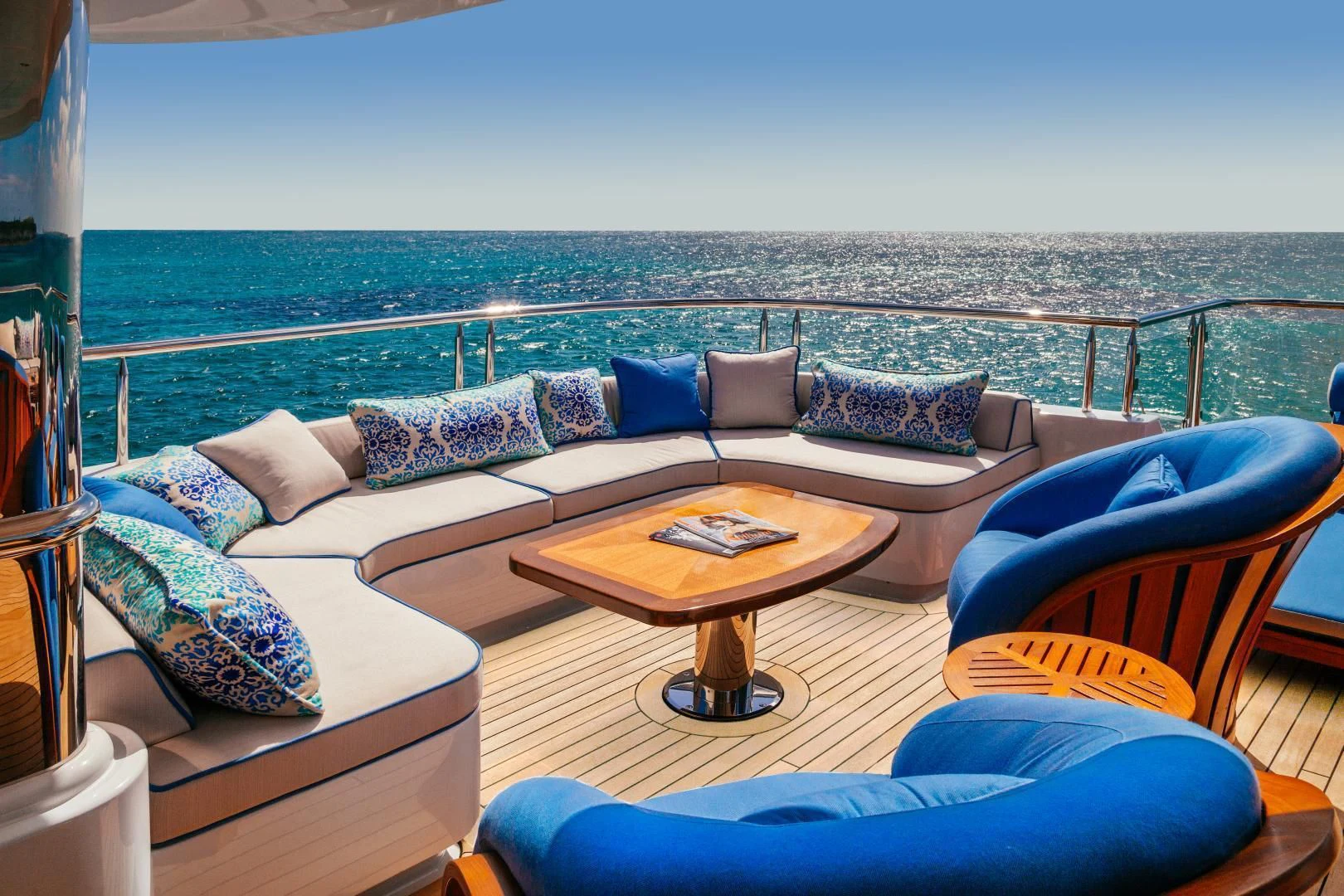 a living room with a large body of water aboard STARSHIP Yacht for Charter