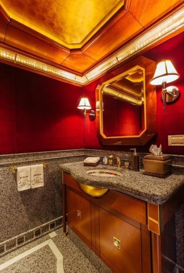 a bathroom with a countertop sink and a mirror aboard STARSHIP Yacht for Charter