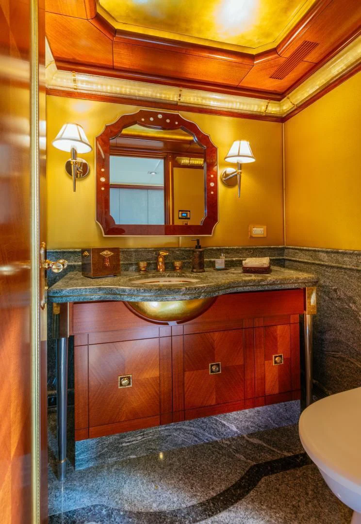 a bathroom with a large mirror aboard STARSHIP Yacht for Charter