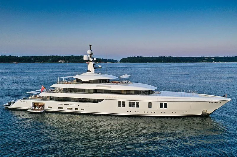 a large white boat in the water aboard LUNASEA Yacht for Sale