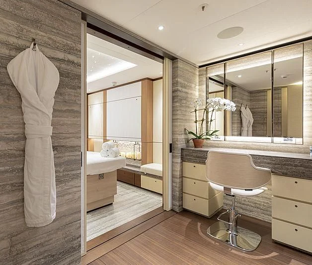 a bathroom with a large mirror aboard LUNASEA Yacht for Sale