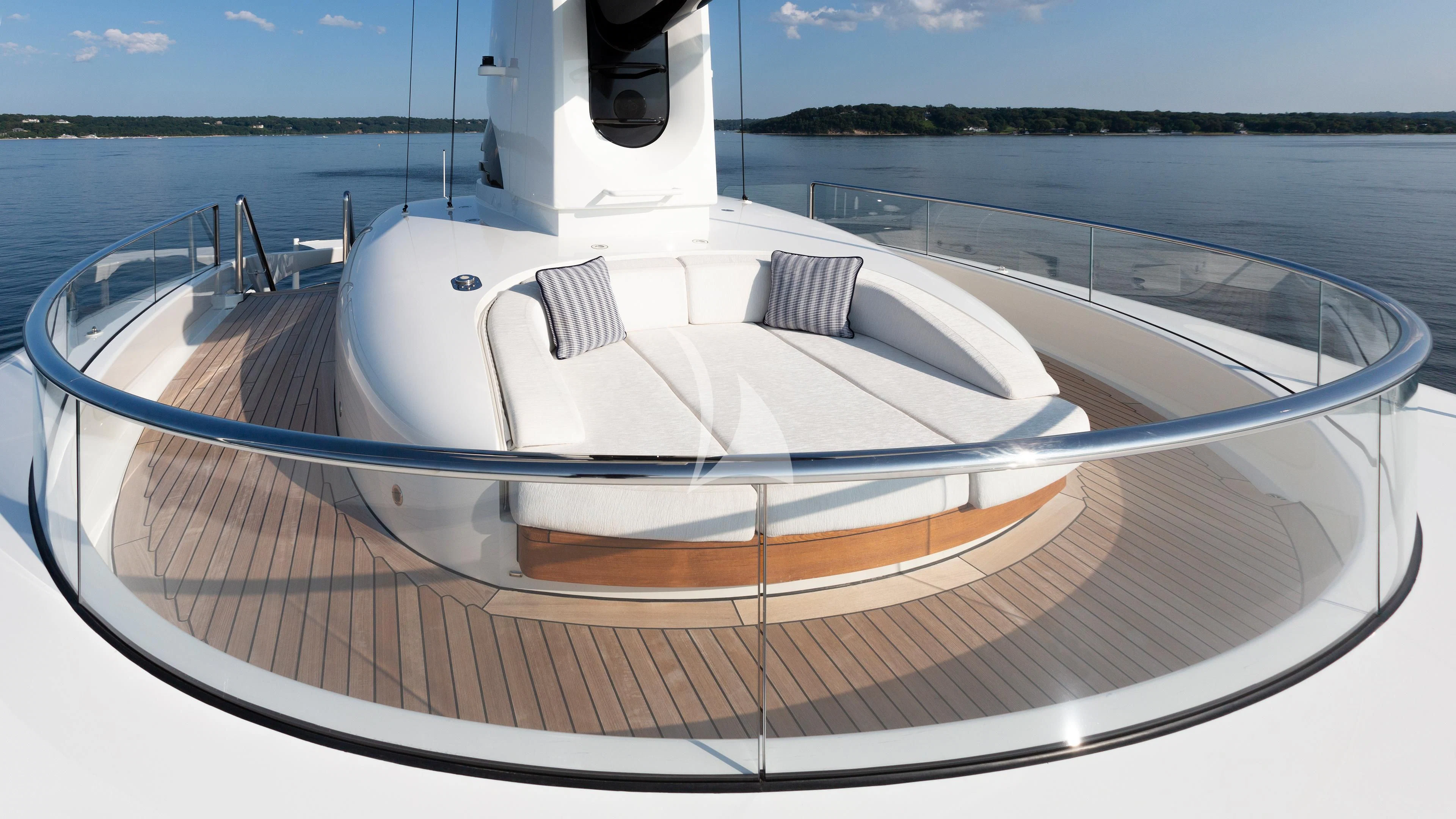 a white boat on a body of water aboard LUNASEA Yacht for Sale