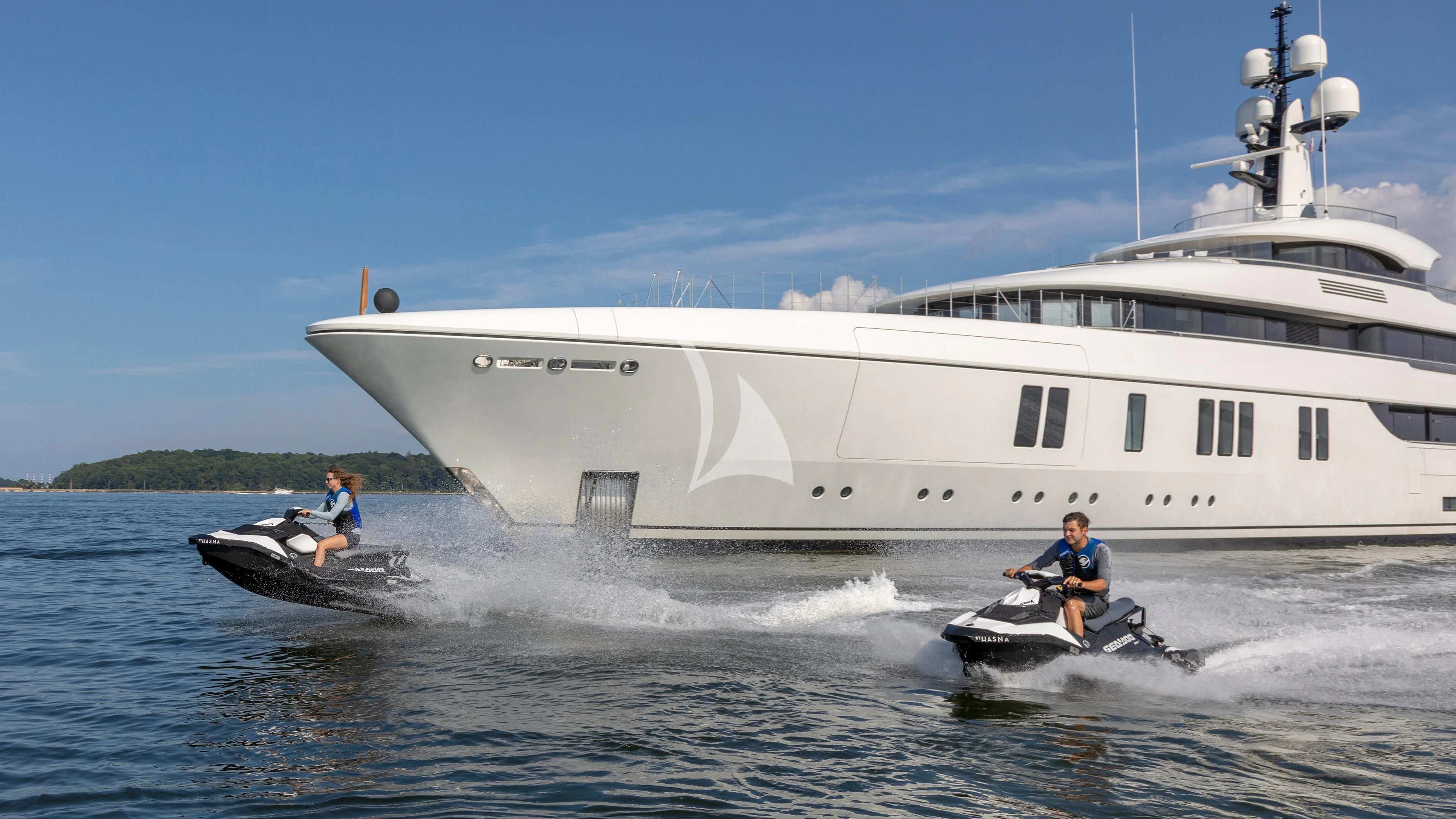 a couple of people on a boat in the water aboard LUNASEA Yacht for Sale