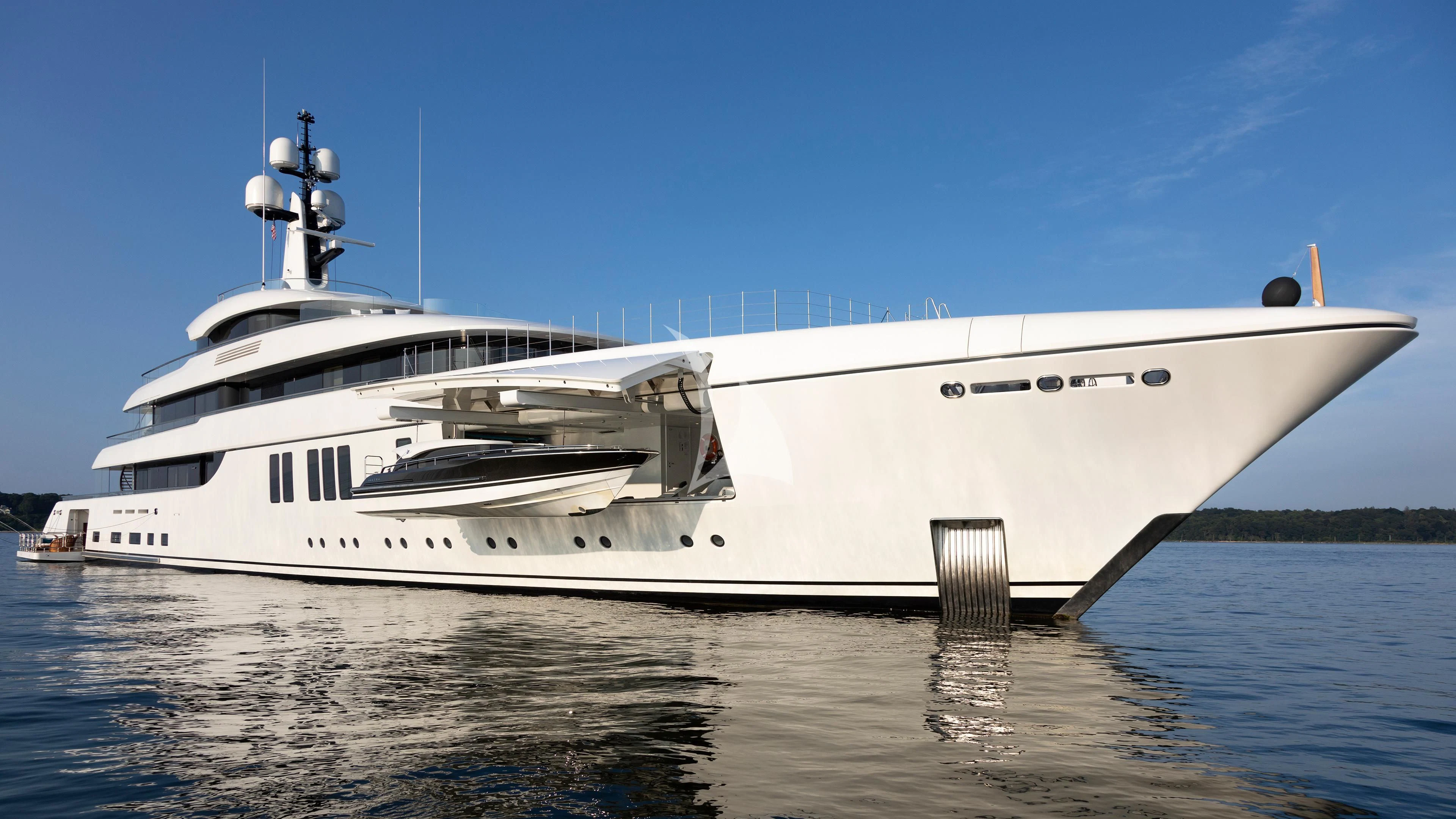 a white yacht on the water aboard LUNASEA Yacht for Sale