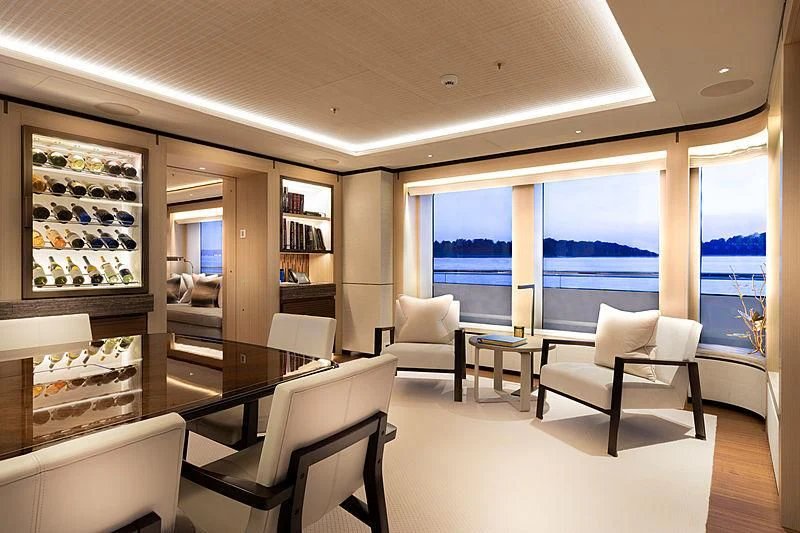 a room with a large window and a view of the ocean aboard LUNASEA Yacht for Sale