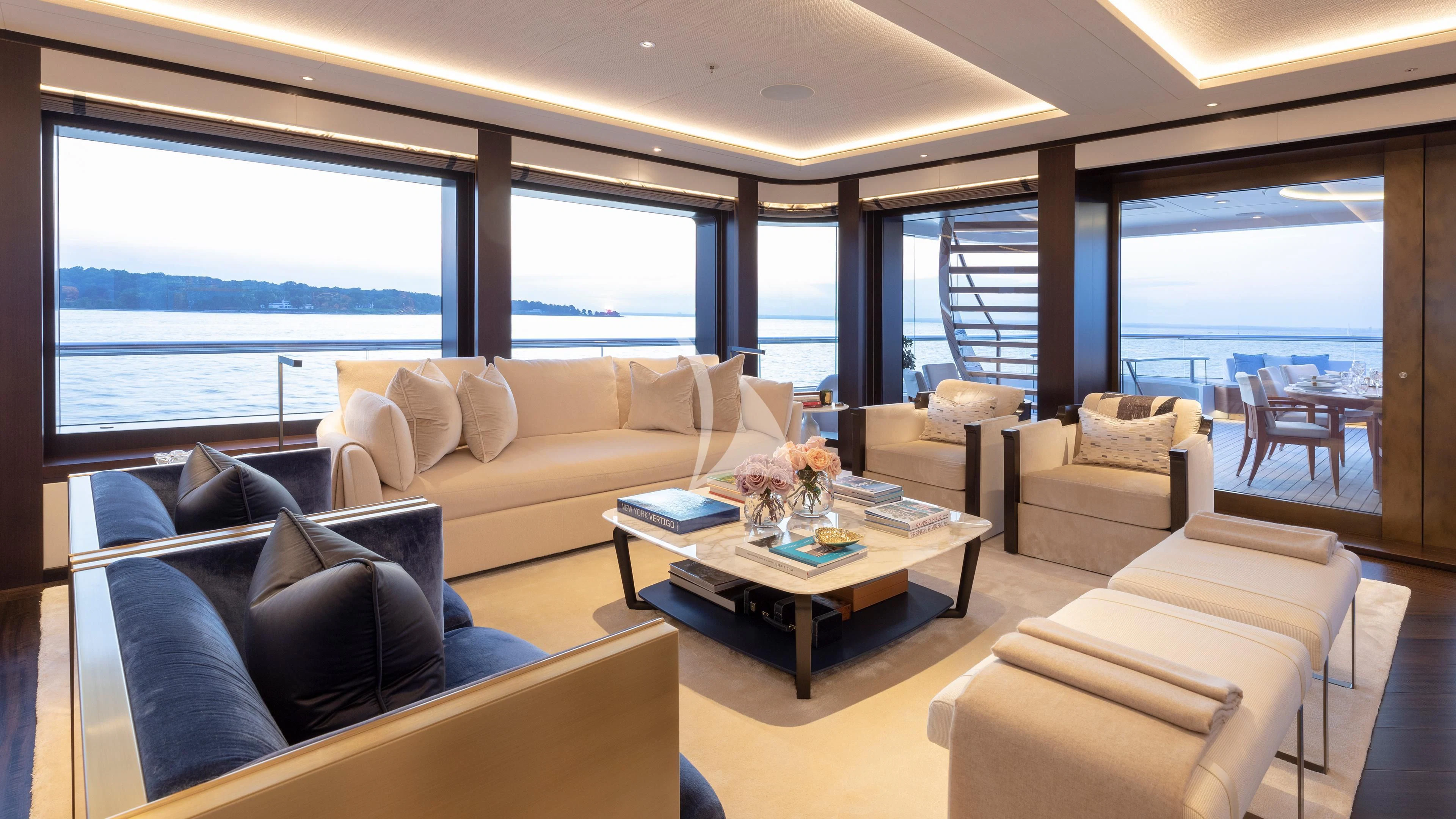 a living room with a large window aboard LUNASEA Yacht for Sale