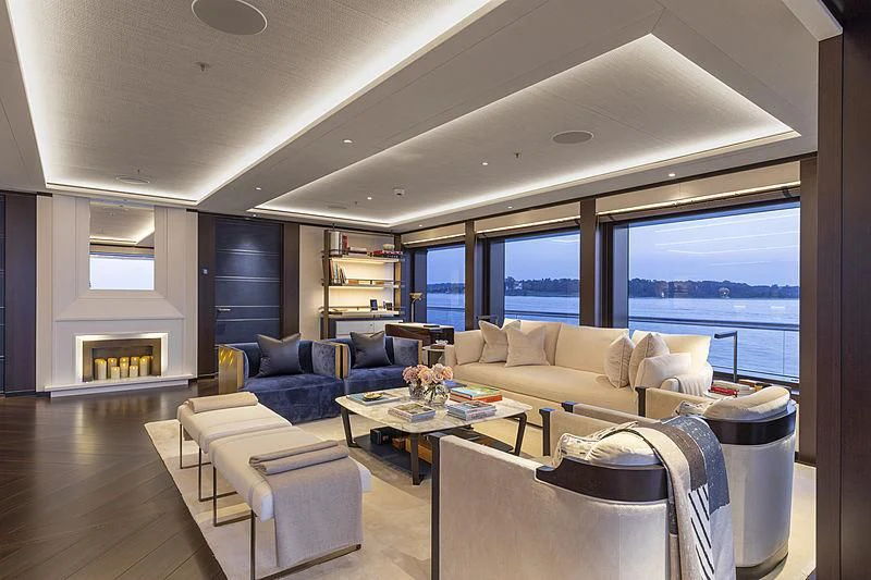 a living room with a large window aboard LUNASEA Yacht for Sale