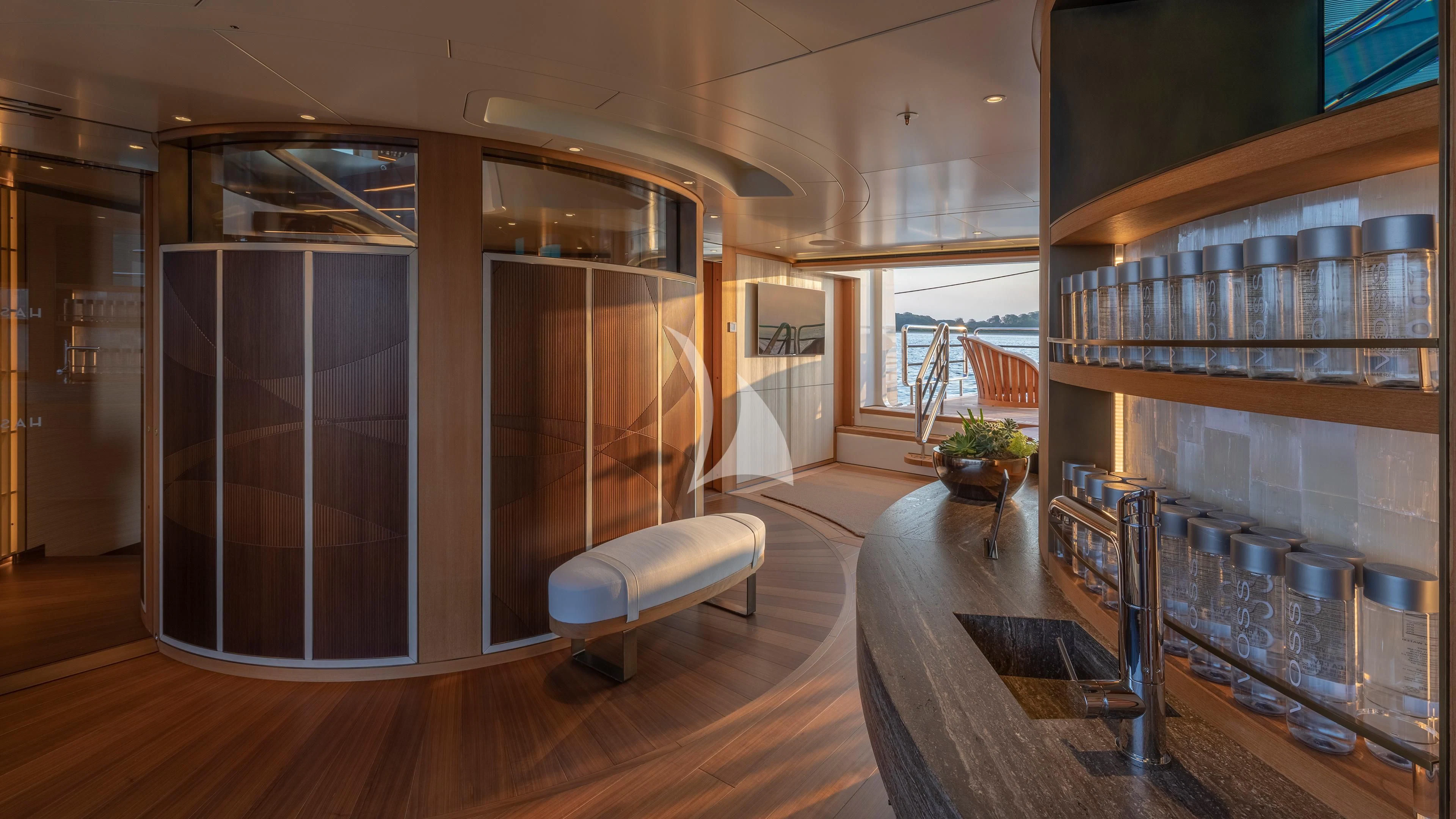 a room with a table and chairs aboard LUNASEA Yacht for Sale