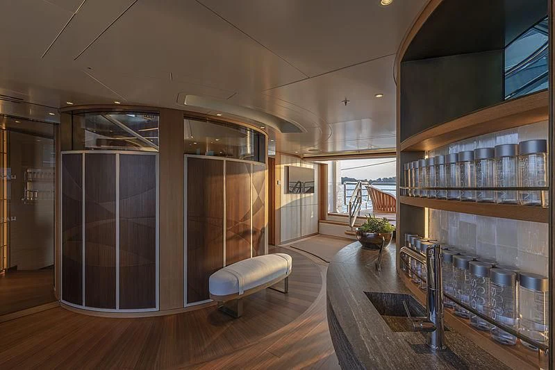 a room with a glass wall aboard LUNASEA Yacht for Sale