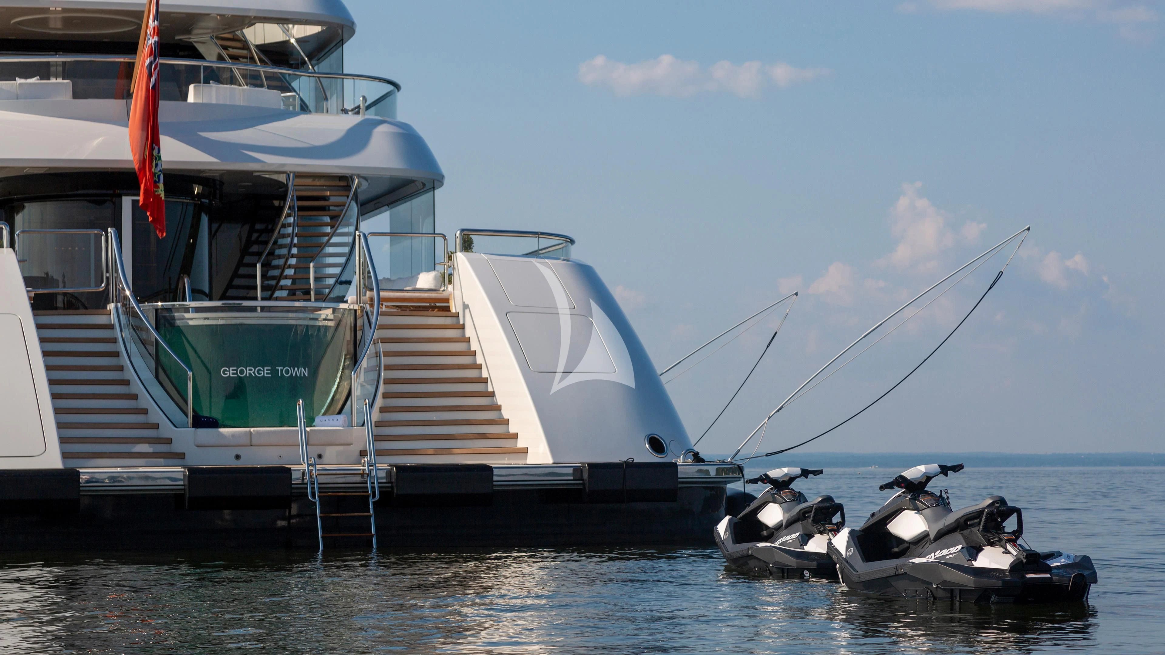 a boat docked at a pier aboard LUNASEA Yacht for Sale