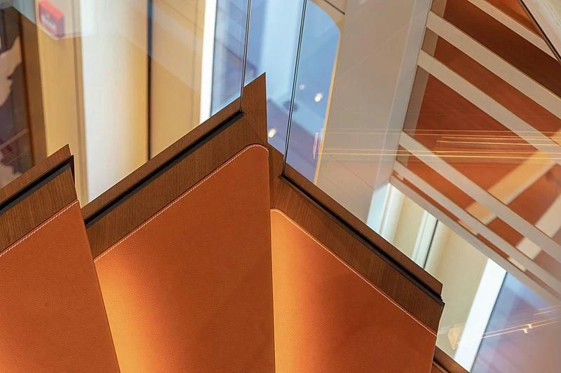 a hallway with several windows aboard LUNASEA Yacht for Sale