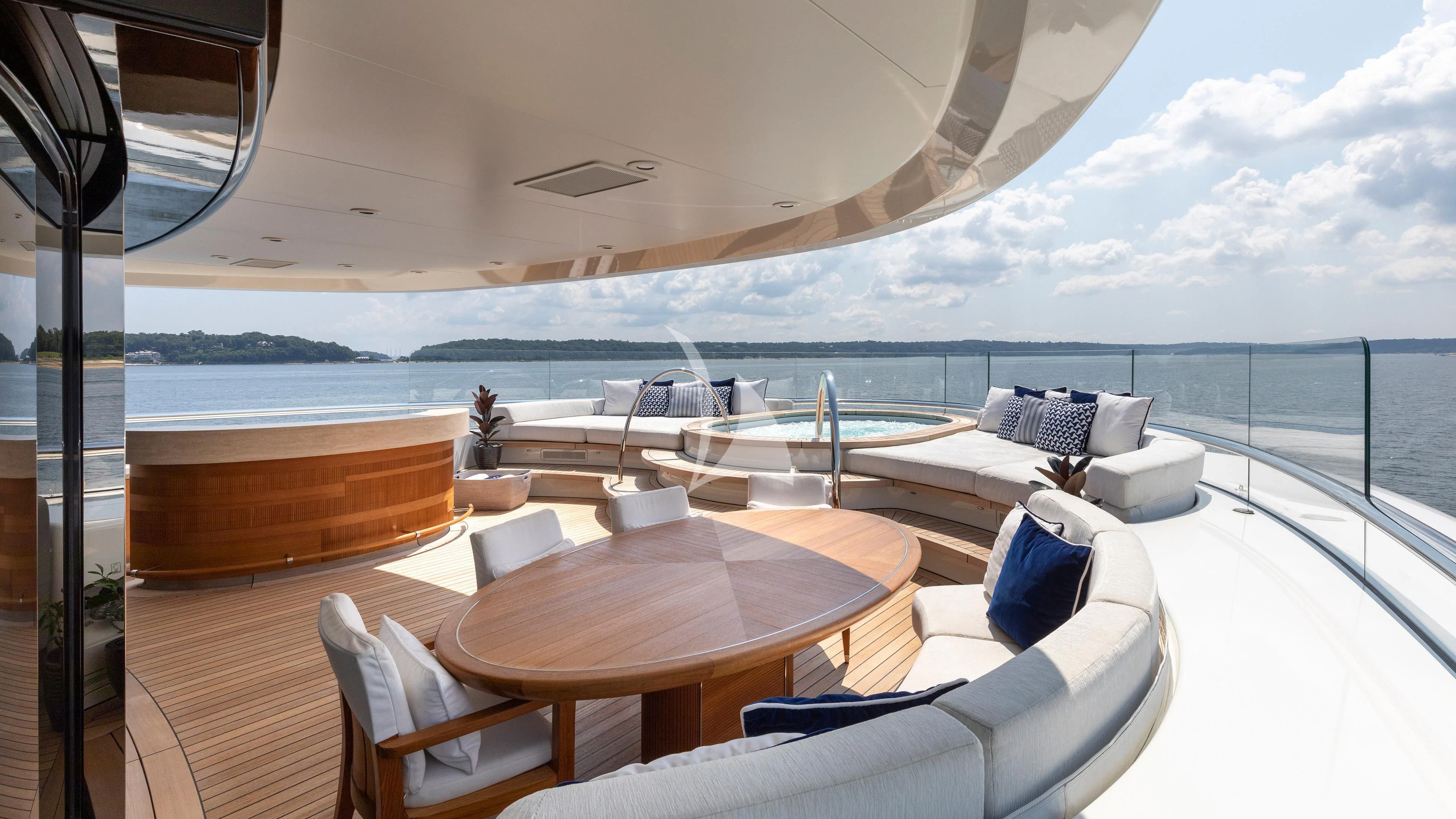 a table and chairs on a boat aboard LUNASEA Yacht for Sale