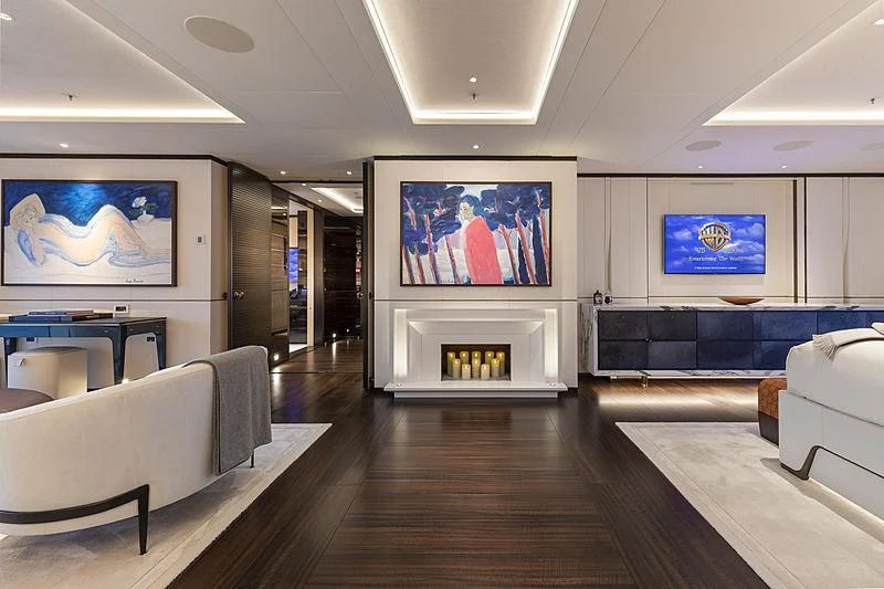 a large room with a large screen aboard LUNASEA Yacht for Sale
