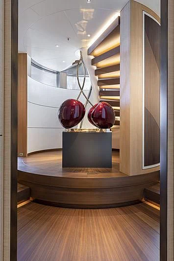 a room with a glass wall and a computer monitor aboard LUNASEA Yacht for Sale