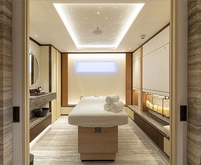 a bathroom with a tub sink and a mirror aboard LUNASEA Yacht for Sale