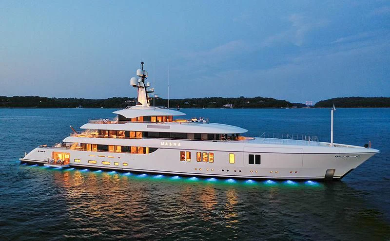 a large white boat on the water aboard LUNASEA Yacht for Sale