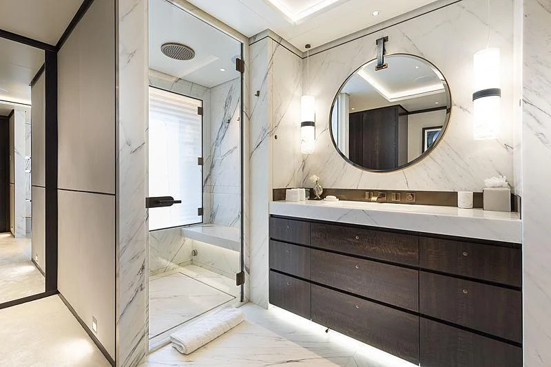 a bathroom with a large mirror aboard LUNASEA Yacht for Sale