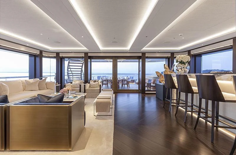 a living room with a large window aboard LUNASEA Yacht for Sale